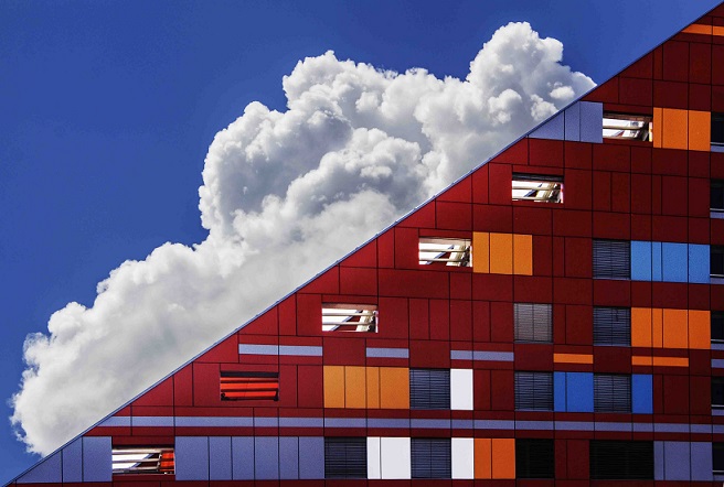 Cloud in sky and building by Ivan Cujic